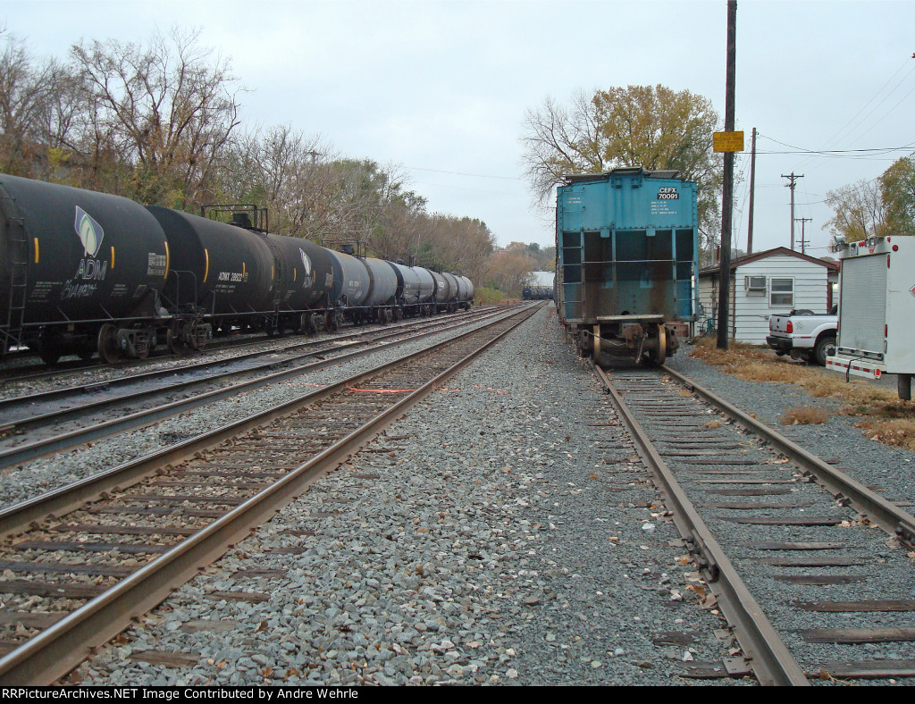Tank cars and hoppers line the elevator sidings